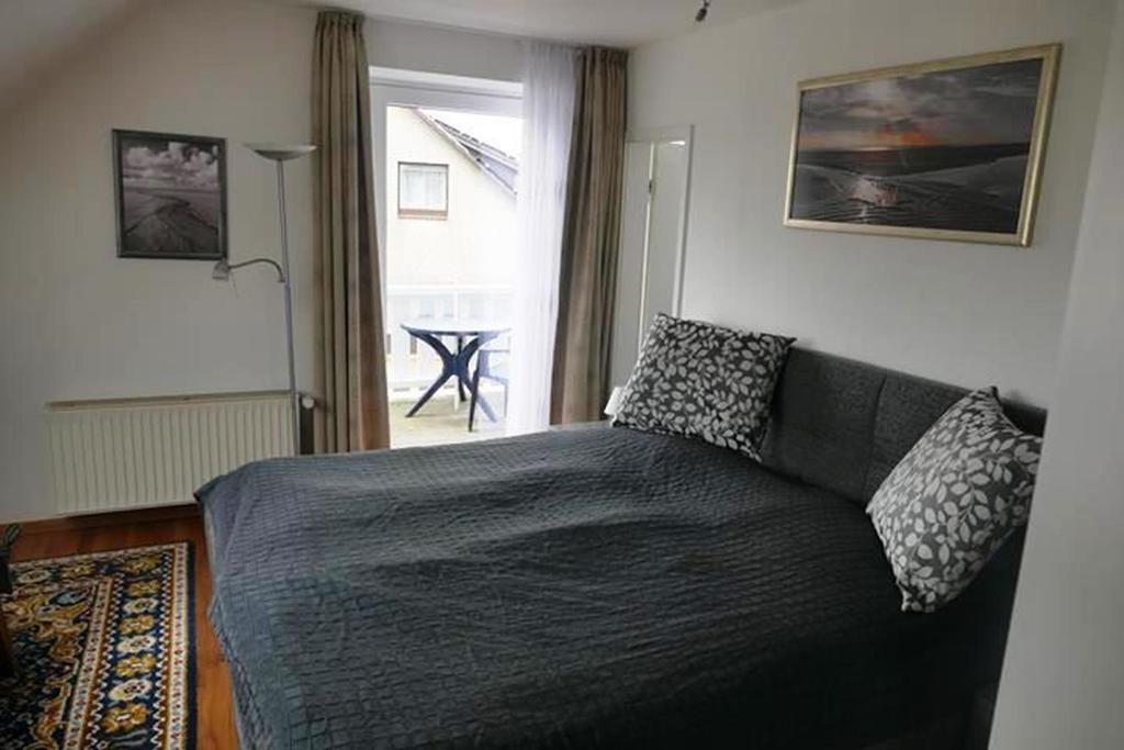 Apartamento "Haus Am Deich" Cuxhaven Exterior foto